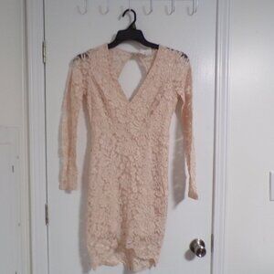beige lace dress with low cut back